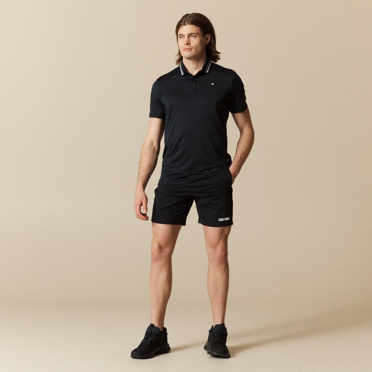 apin261081534-core-2026-polo-short-black-m-01-3x-1140x1140-1